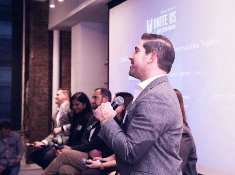 Dan Brillman addressing audience at conference