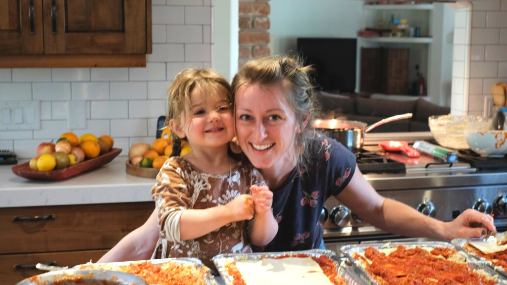 woman and daughter making lasagna