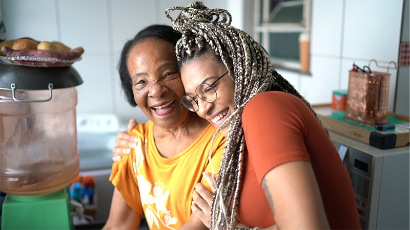 Two woman laughing