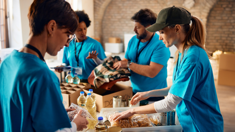 volunteers helping package up supplies