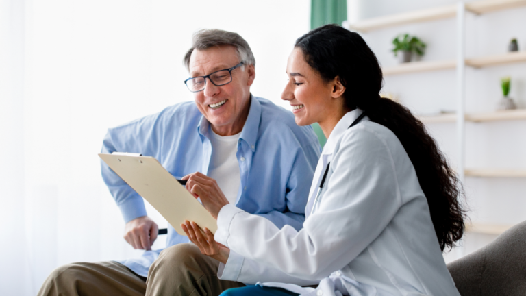 older man consulting with doctor