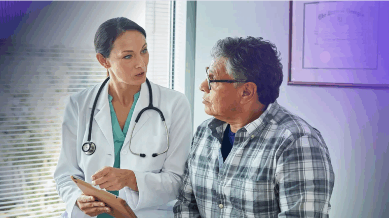 Female doctor speaking with older patient